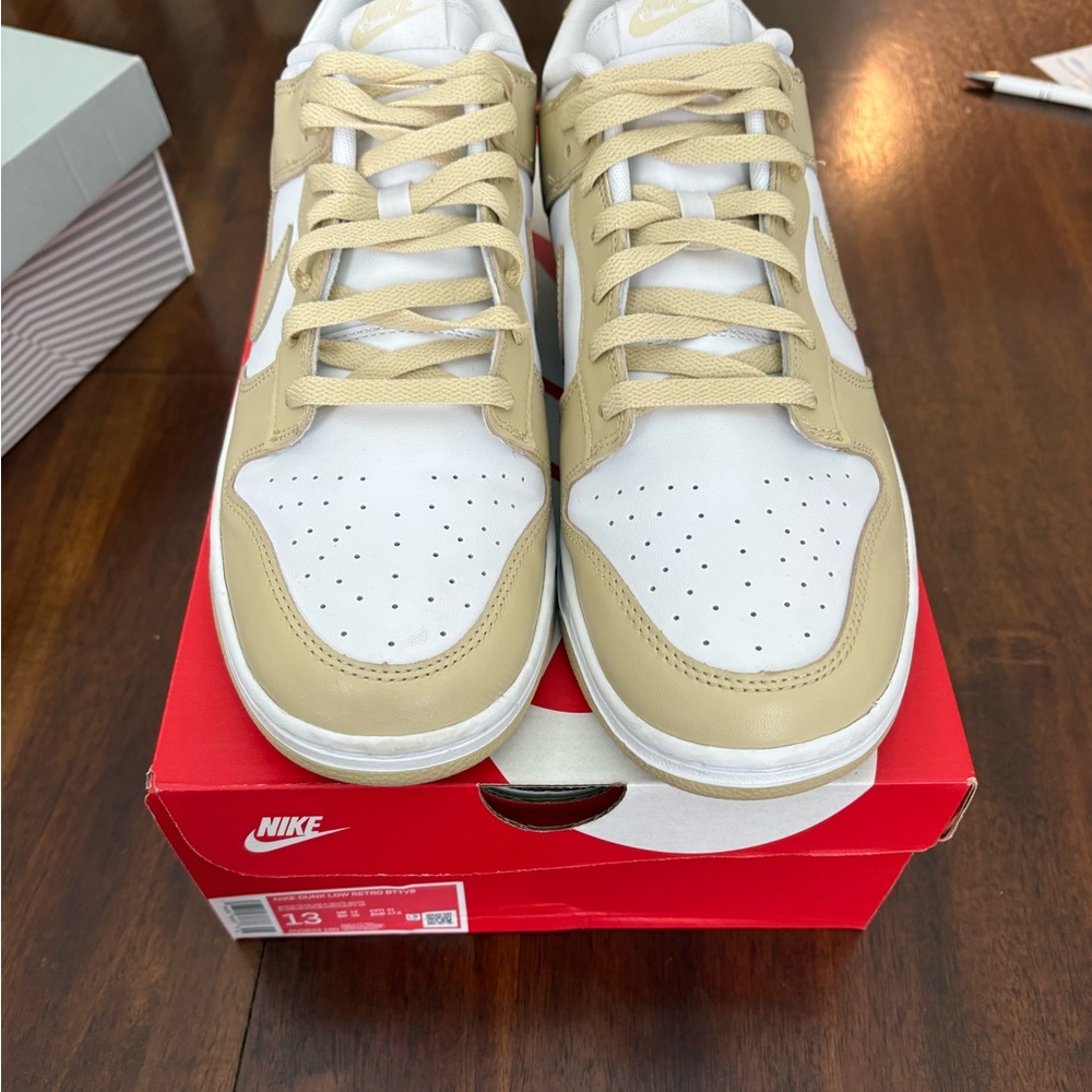 Nike Dunk Low Retro in White and Gold